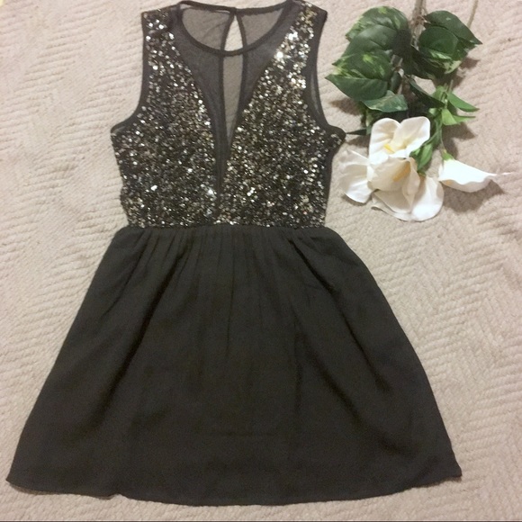 Forever 21 Dresses & Skirts - Deep V Party Dress with Silver Sequin Detail